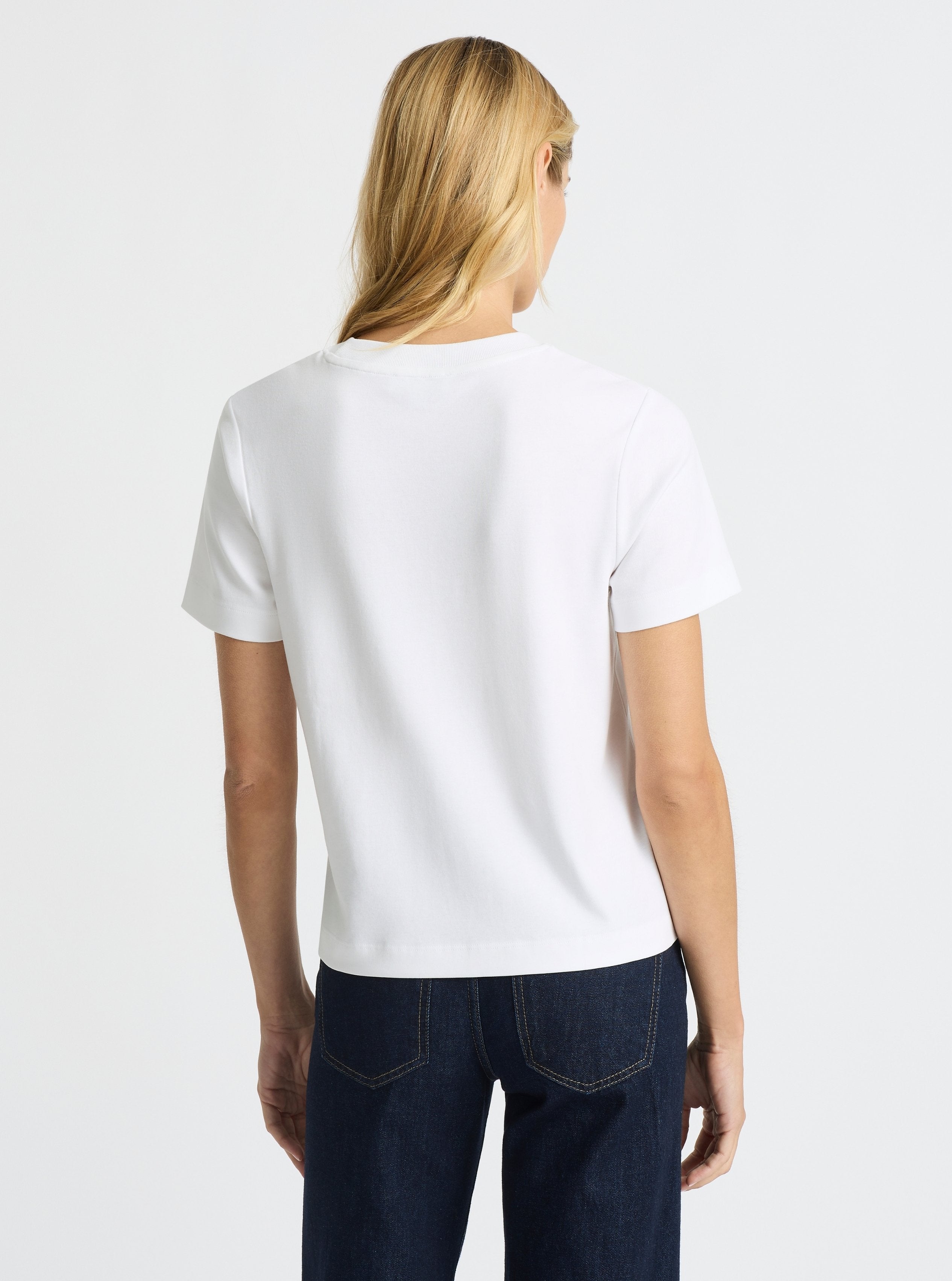 White|Good Earth Cotton® Box Cut Tee – Sustainable Cotton T-shirt|Karolina is 5'10" and wearing a size S
