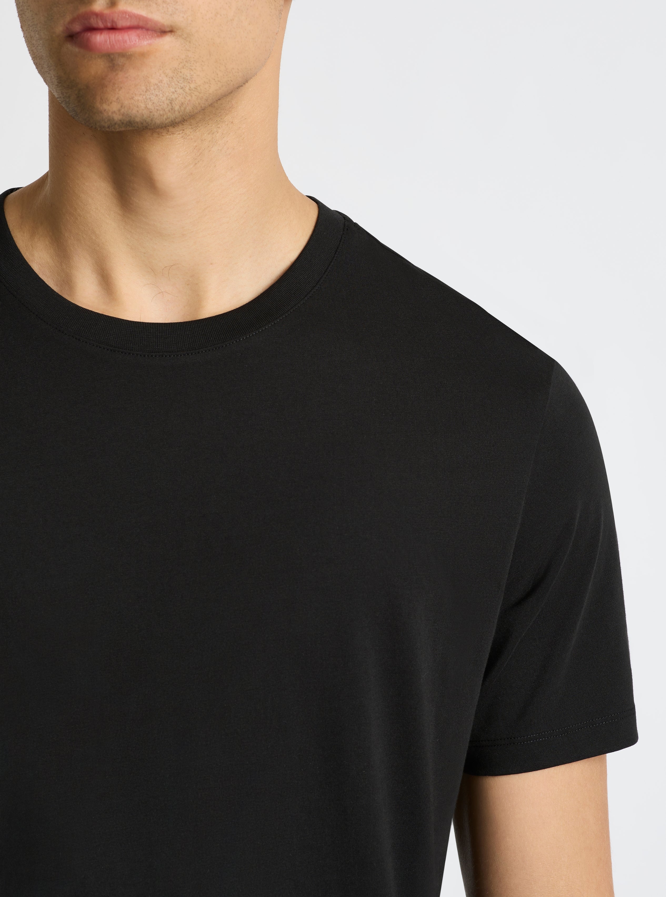 Black|Good Earth Cotton® Classic Tee – Sustainable Cotton T-shirts|Evans is 6’2” and wearing a size M