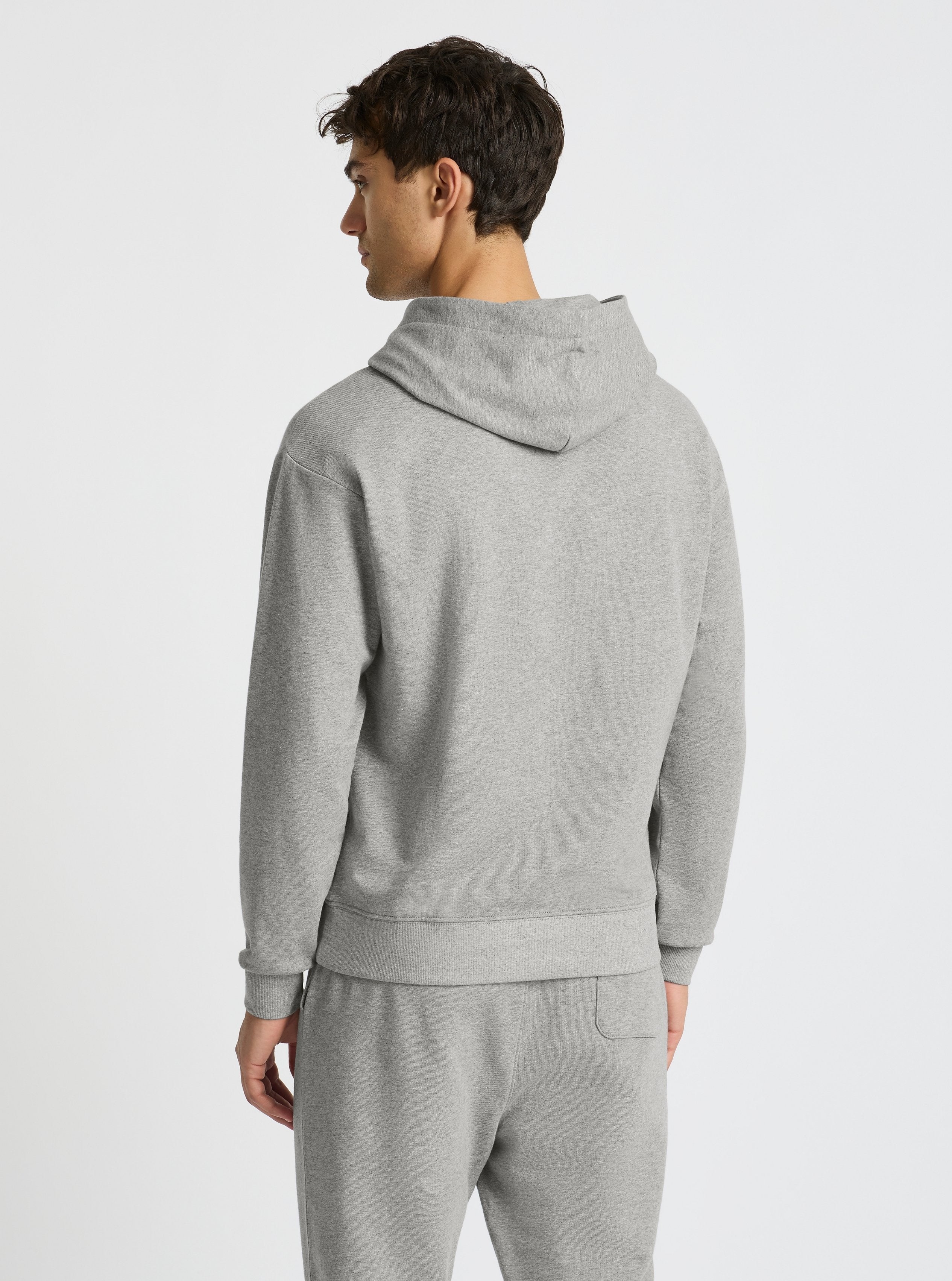Grey Marl|Good Earth Cotton® Hoodie for men – Sustainable Cotton Hoodie|Evans is 6’2” and wearing a size M