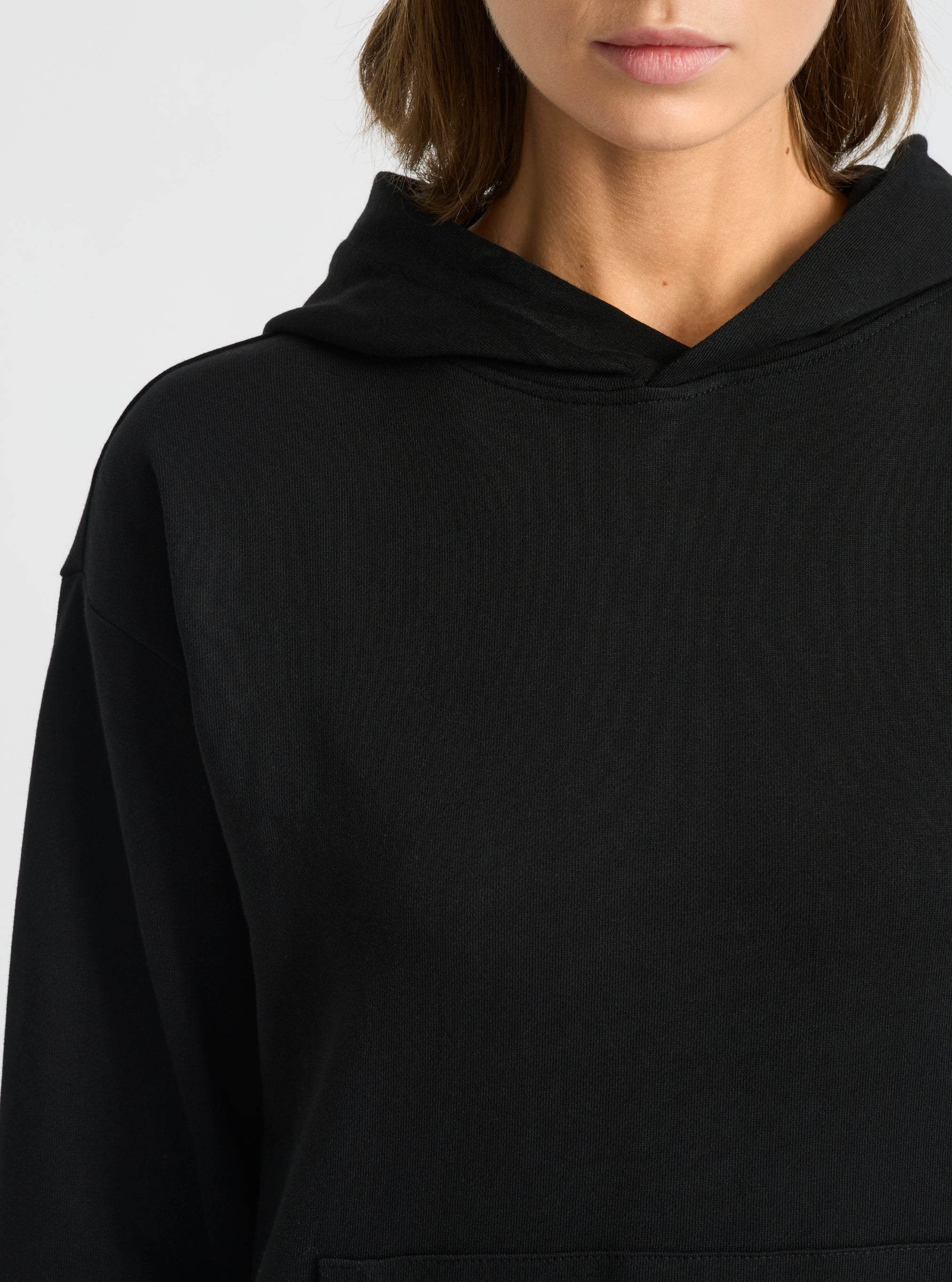 Black|Good Earth Cotton® Clean Hoodie – Sustainable Cotton Sweatshirt|Stas is 5'10" and wearing a size S