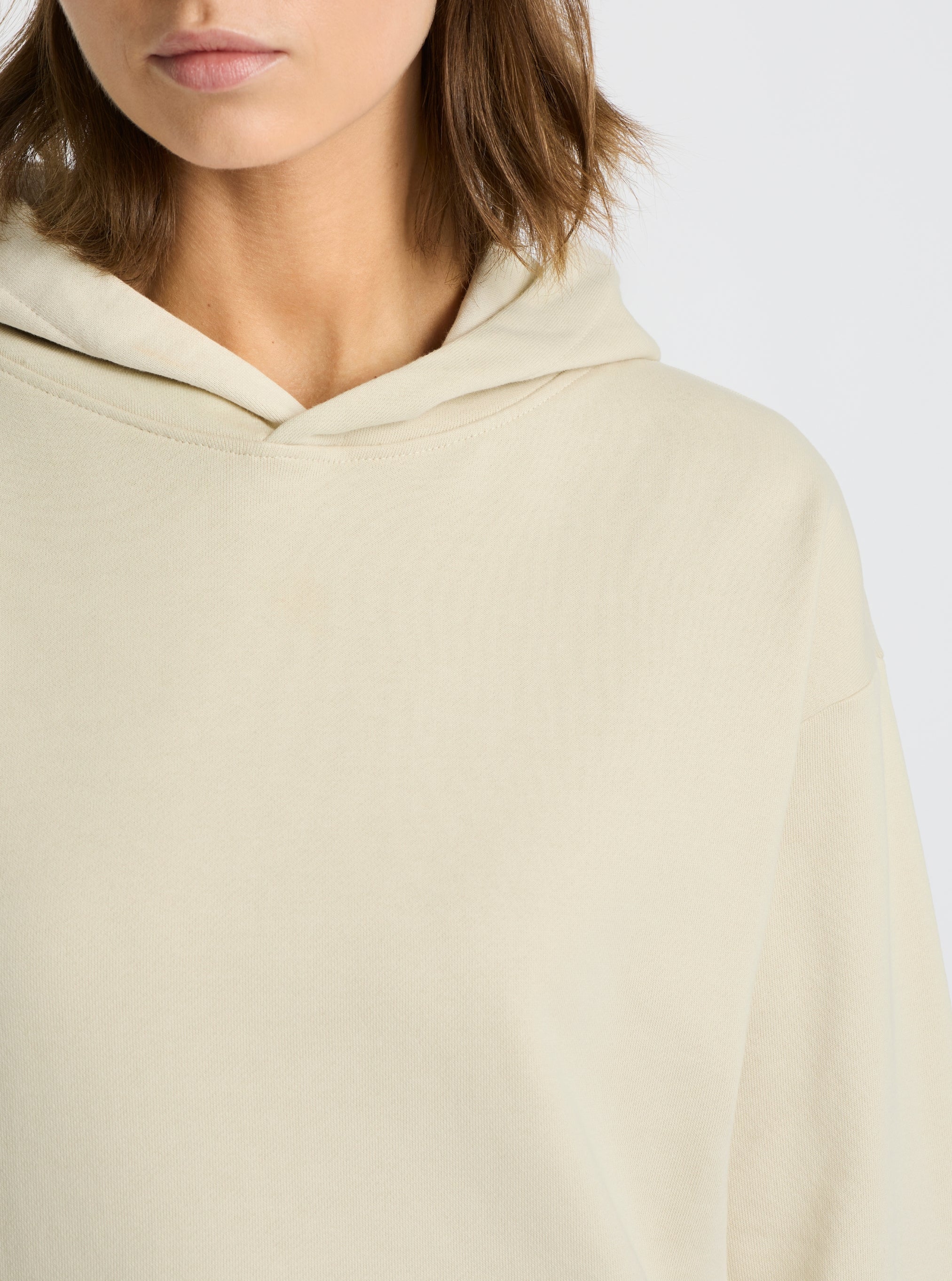 Ecru|Good Earth Cotton® Clean Hoodie – Sustainable Cotton Sweatshirt|Stas is 5'10" and wearing a size S