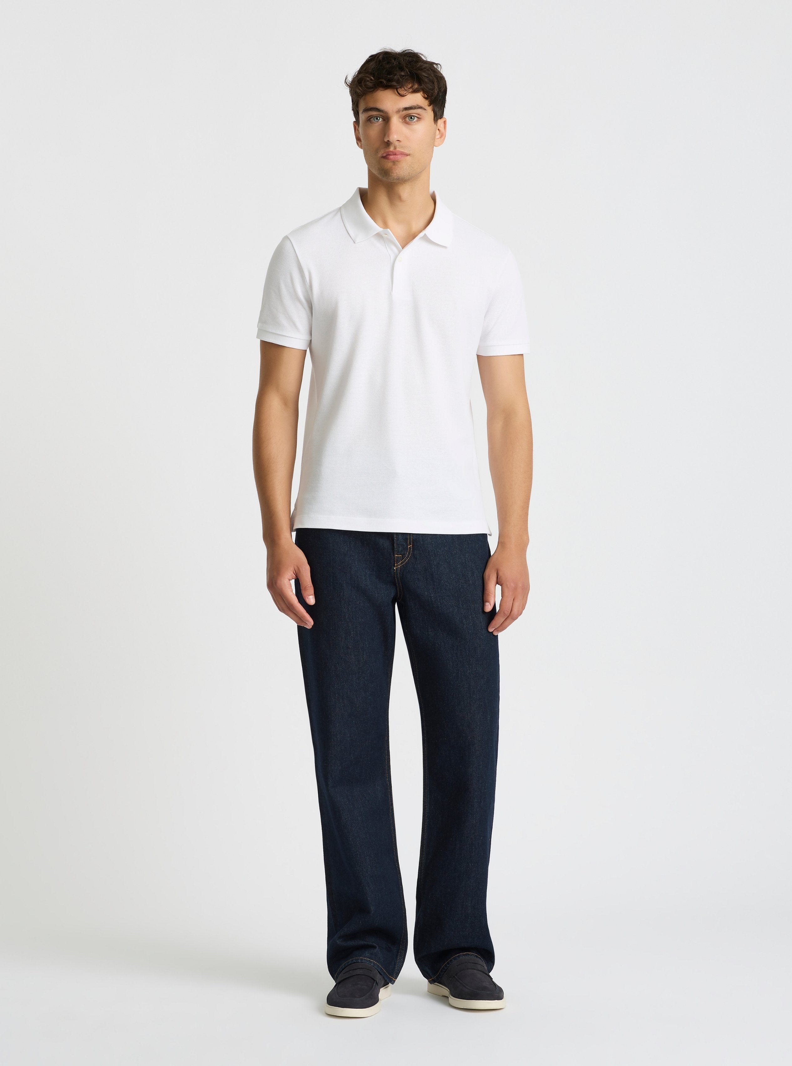 White|Good Earth Cotton® Polo – Sustainable Cotton Polo|Evans is 6’2” and wearing a size M