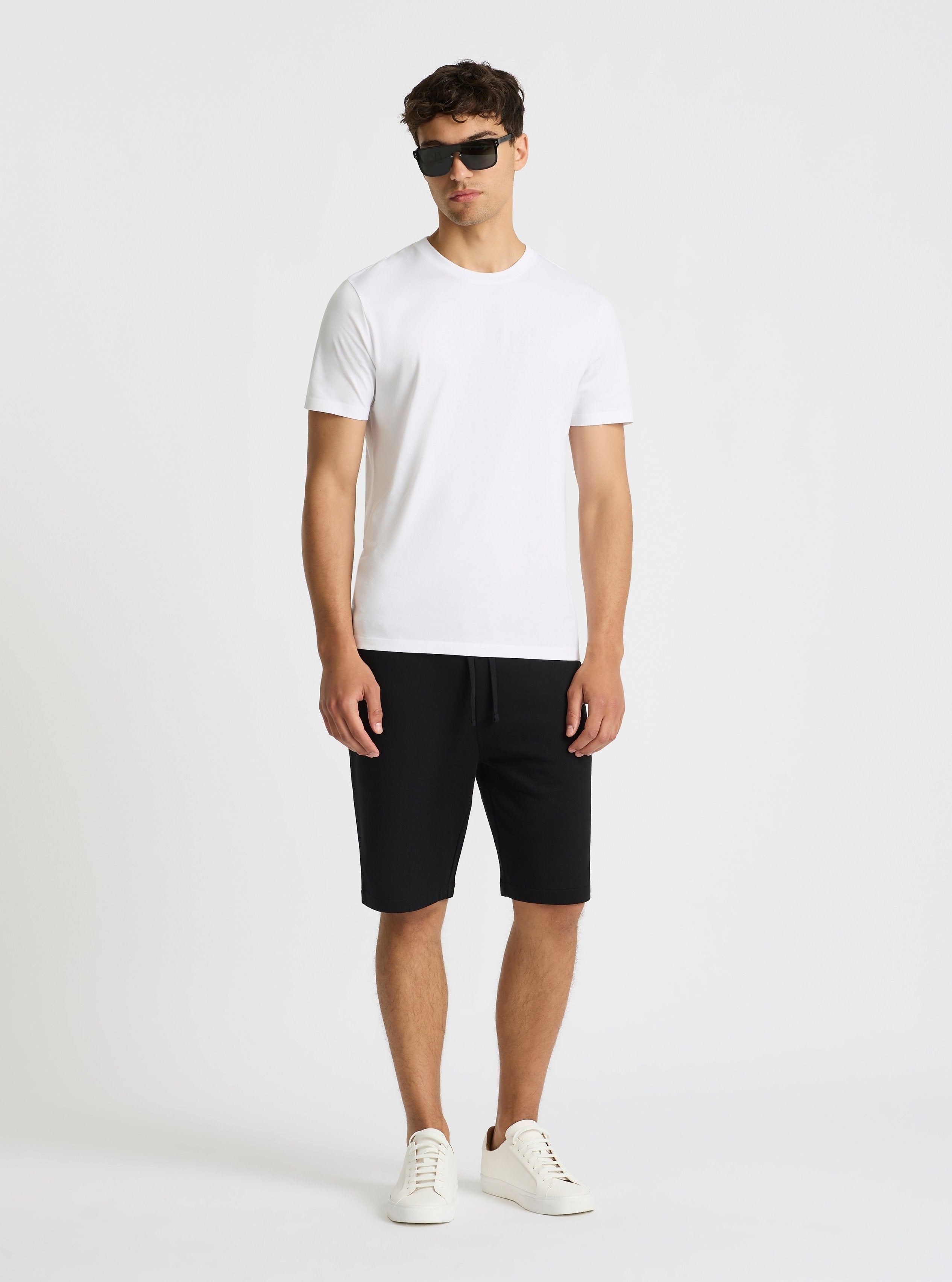 Black|Good Earth Cotton® Shorts – Sustainable Cotton Shorts|Evans is 6’2” and wearing a size M